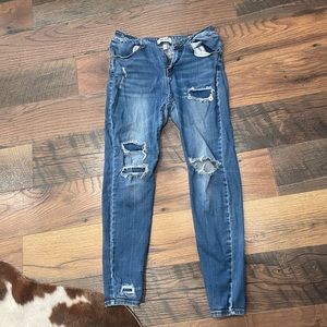 Cute skinny jeans. Brand: Wax Jean, Size: 11/33. Does have one patch ripped.
